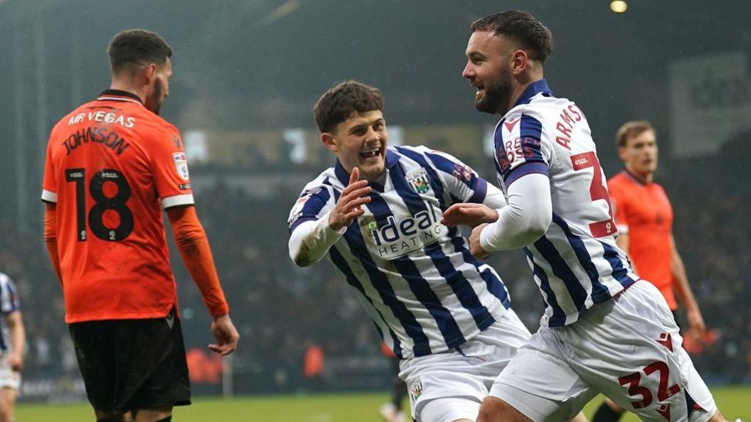 Adam Armstrong celebrates after scoring on debut for West Brom