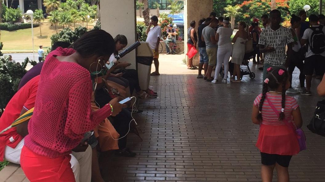 Cuban use one of the wi-fi hotspots to go online. File photo