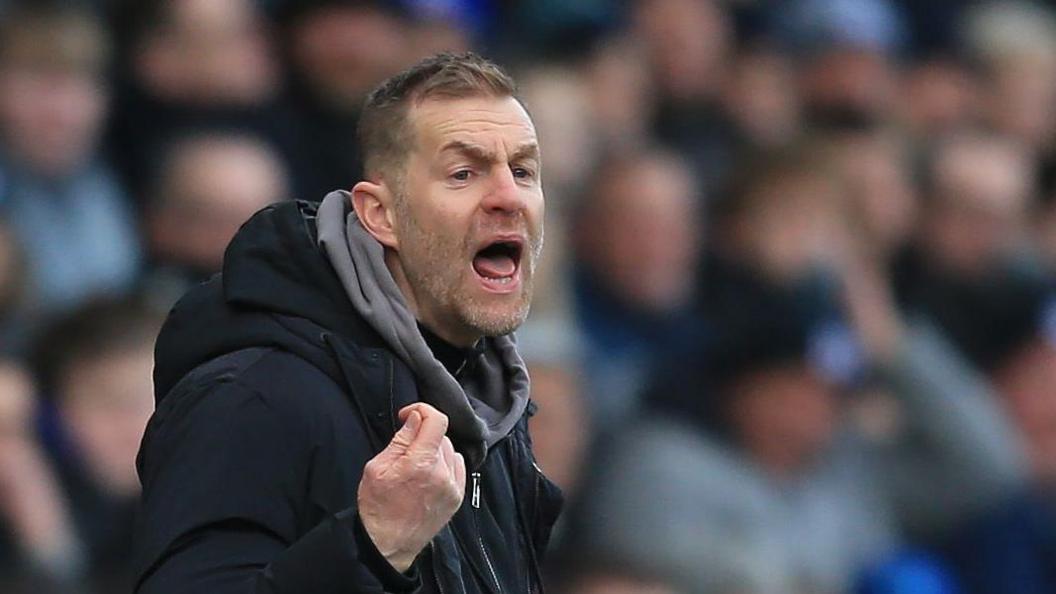 Simon Weaver shouts from the touchline during a recent match