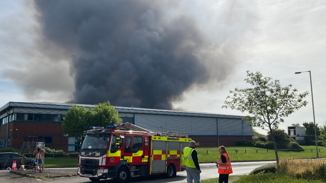 Fire engine and smoke plume