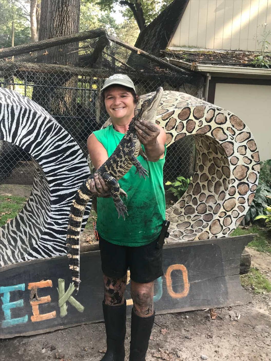 Julie-Angell-Indian-Creek-Zoo-manager-holds-the-reptile-captured-Friday