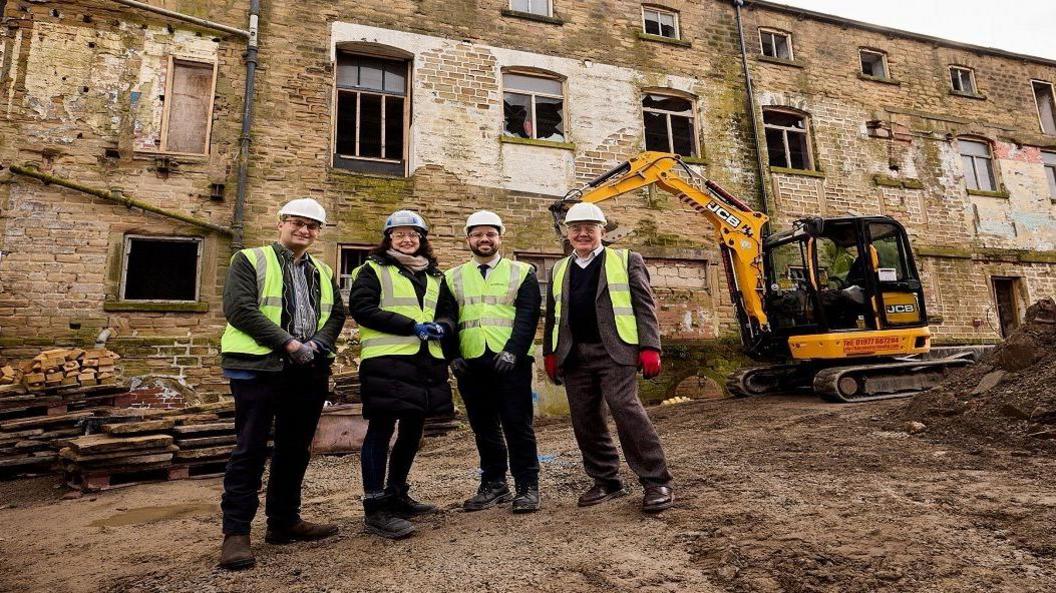  Tom Frater, regional director at Historic England, Louisa Brooks, City and Provincial Properties, Michael Graham, Wakefield Council cabinet member for regeneration and economic growth, and Duncan Wilson, Historic England’s chief executive