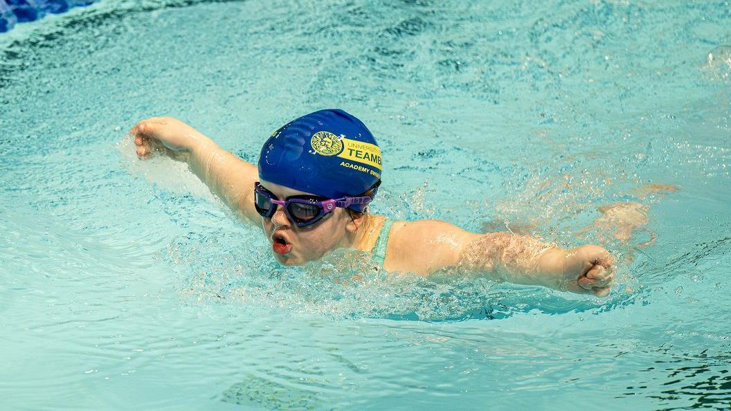 Sophie York swimming in the water