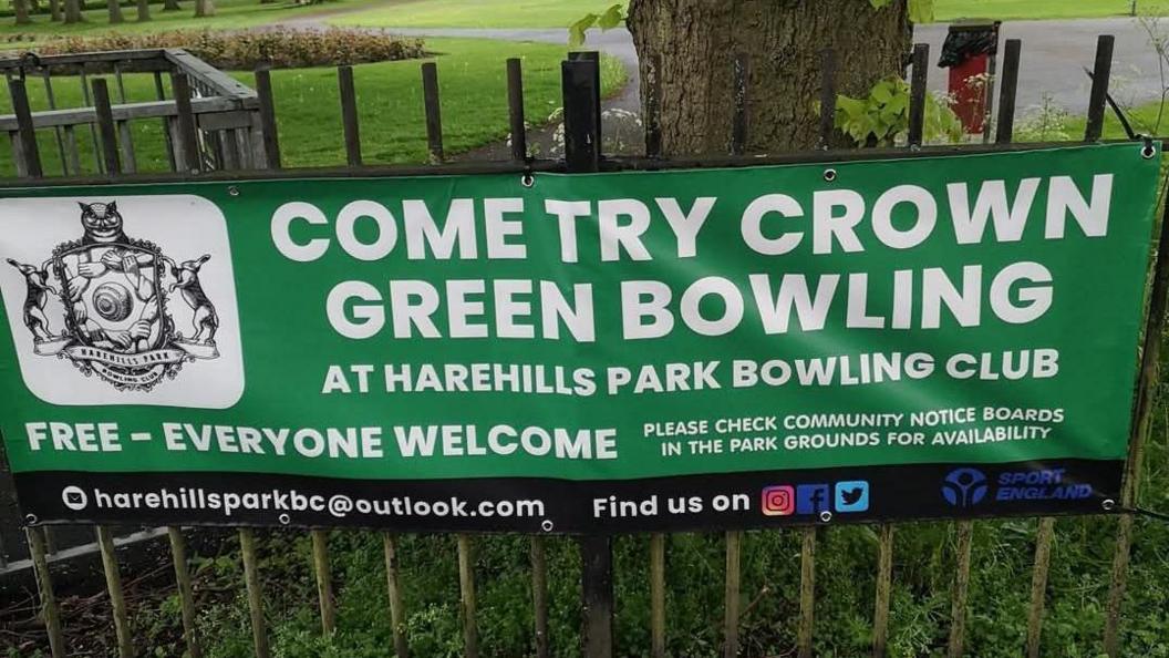 Harehills Bowling Club  banner on a fence