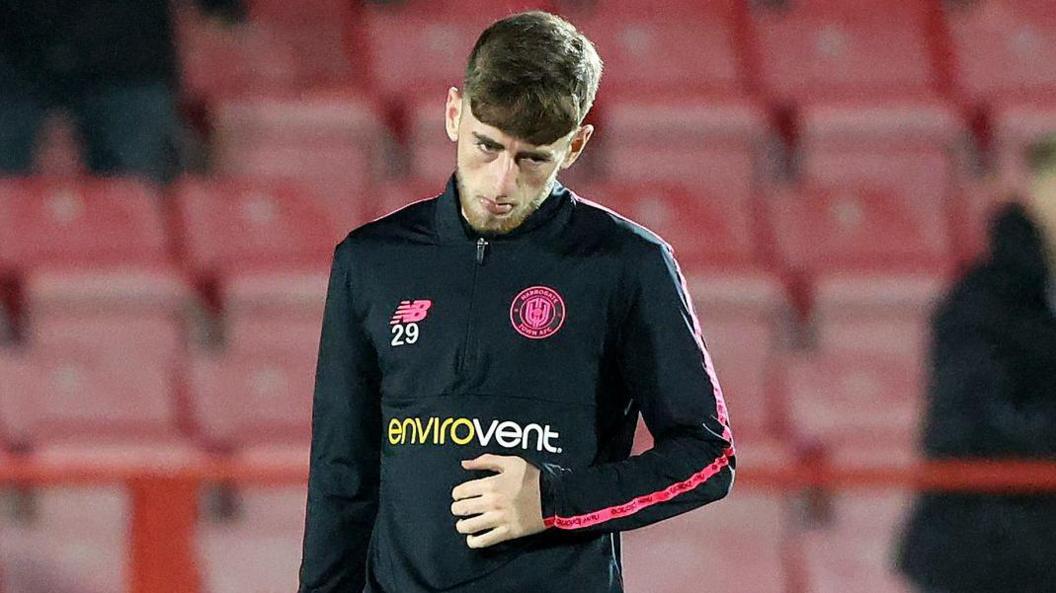 Lucas Barnes during the warm-up before a Harrogate game.