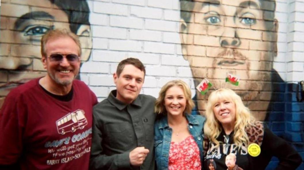 Linda Bailey (right) and her husband (far left) pictured with Joanna Page (Stacey) and Mathew Horne (Gavin) in the centre. 