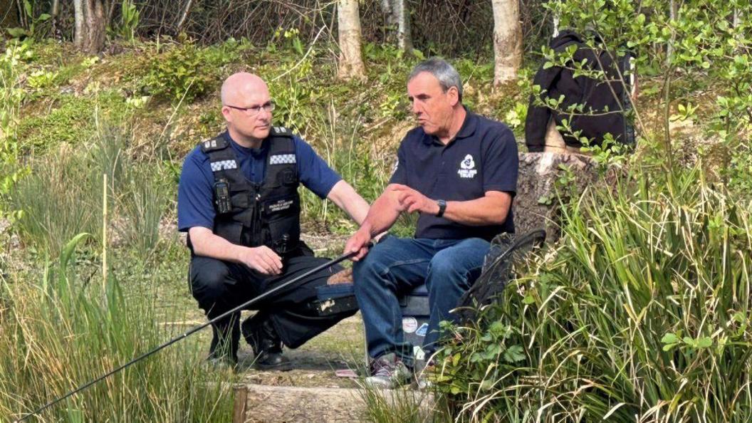 PCSO Daryl Holter with Pulborough Angling Society's club chairman Paul Holden