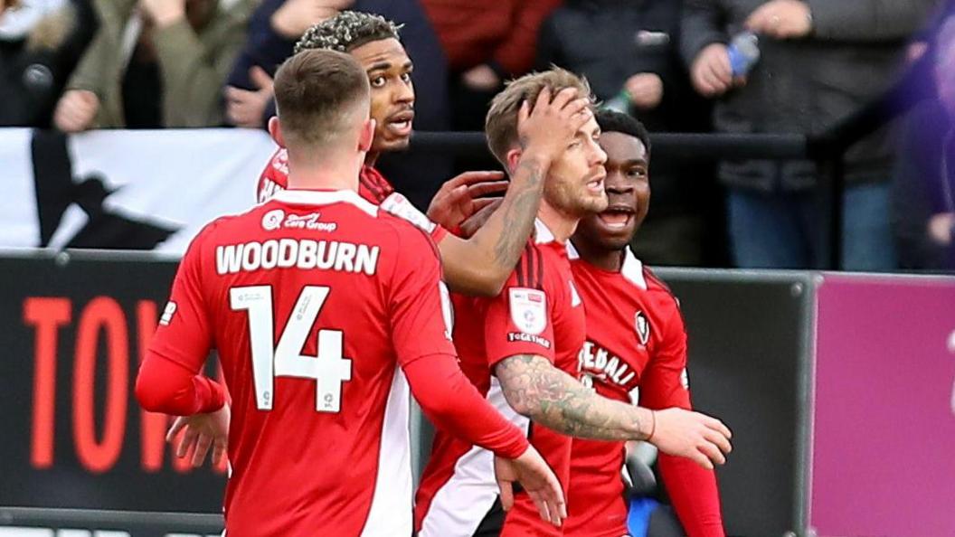 Salford celebrate the opening goal in their win over Notts County