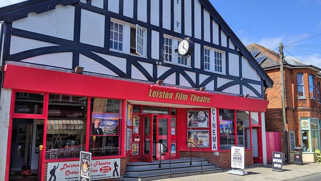 Red and black timber facade of Leiston Film Theatre which will be hosting the book festival   