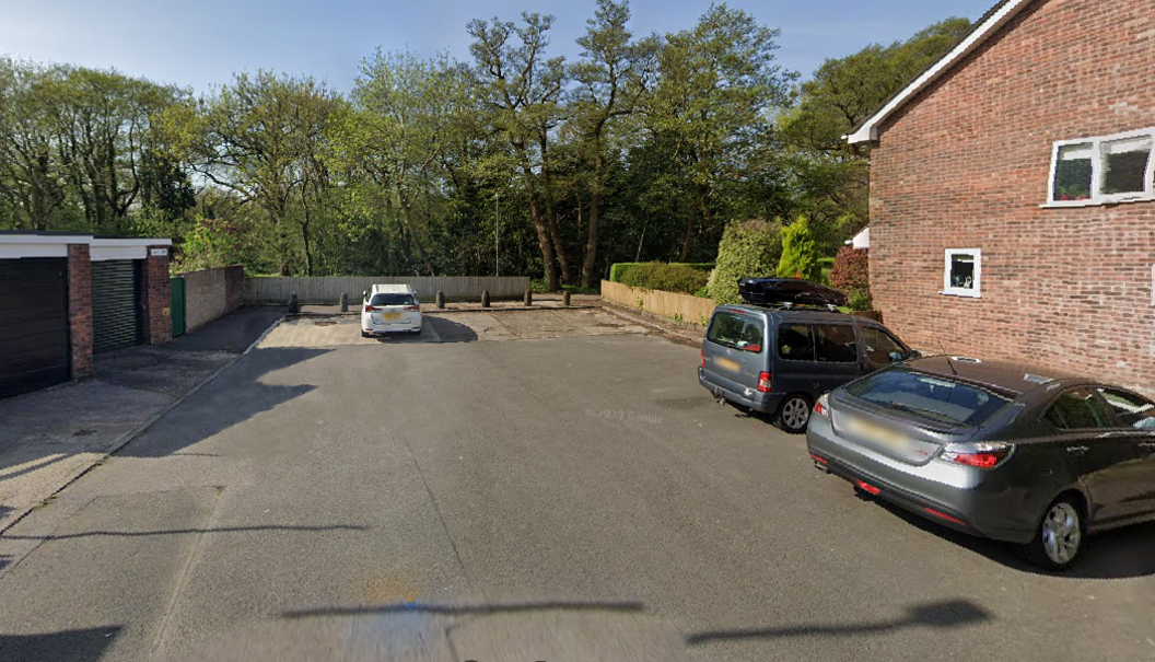 Google Images photo of Glyn Rhosyn, a street in Pontprennau, near where the attack happened, showing houses, garages, wooded area and the road