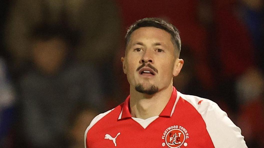 Ronan Coughlan in action for Fleetwood Town last season