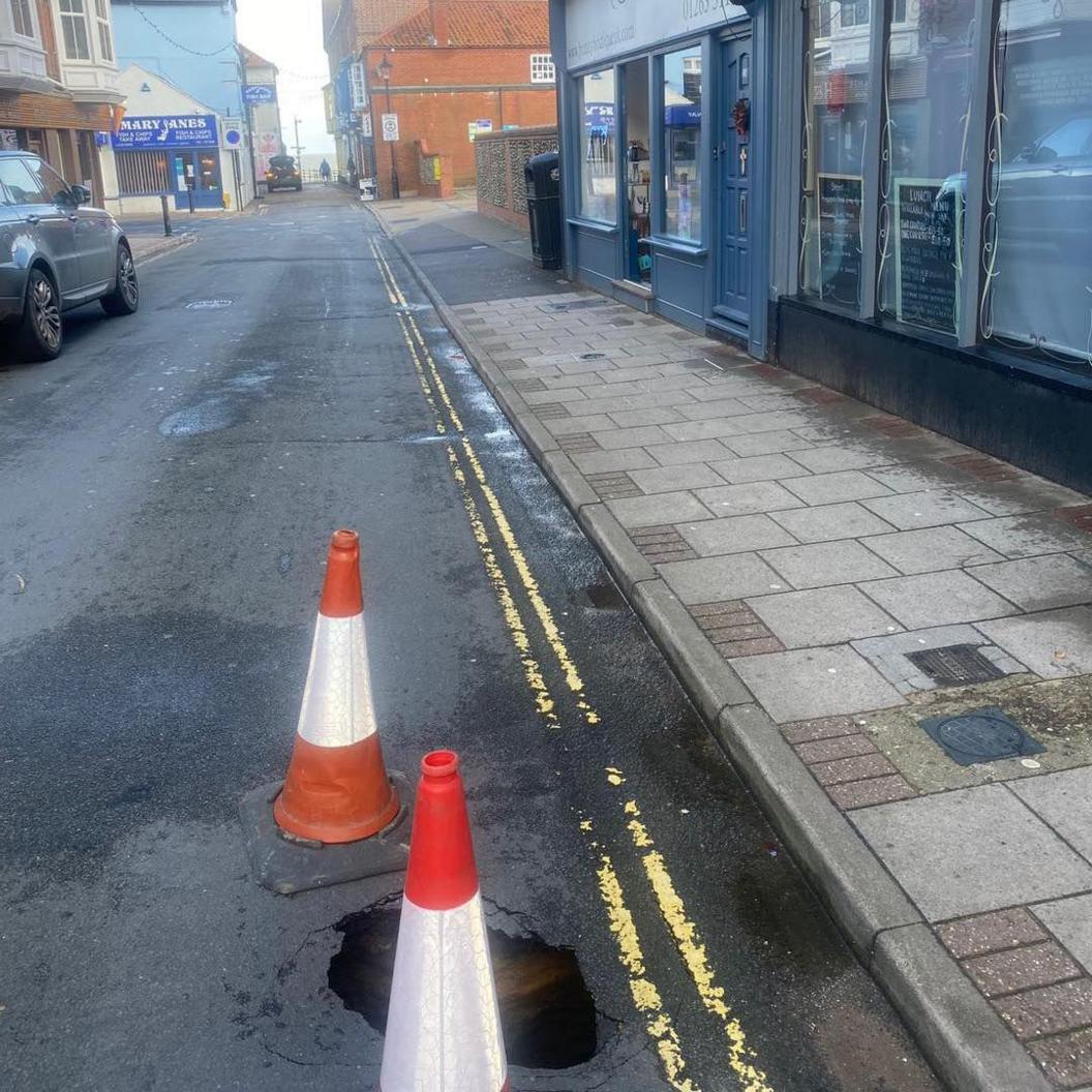 Cones around a sink hole on Garden Street in Cromer