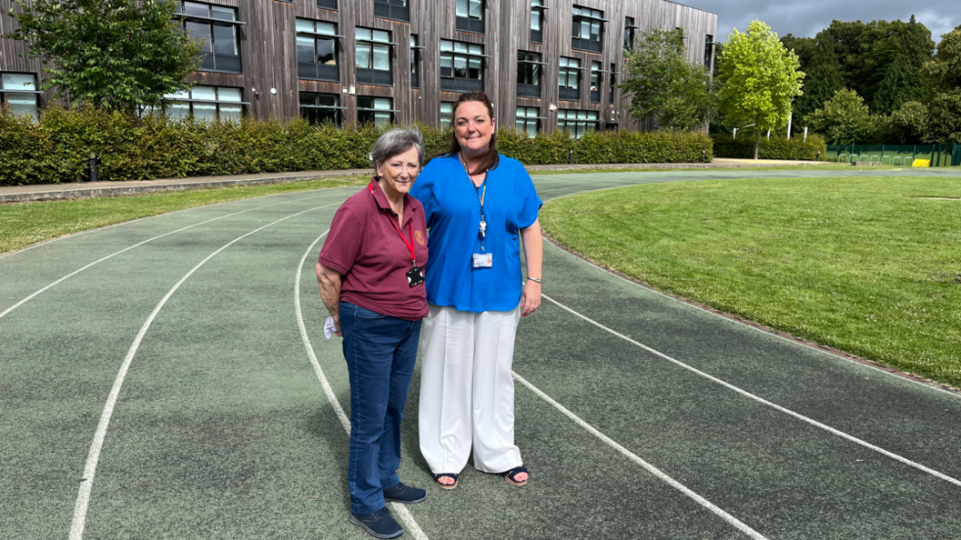 Helen Cromarty and Ruth Shaw pictured on the athletics track