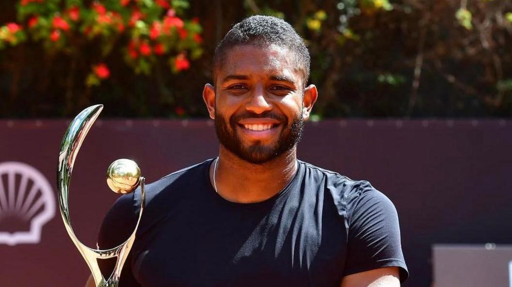 Joao Lucas Reis da Silva lifts the Procopio Cup in Rio de Janeiro