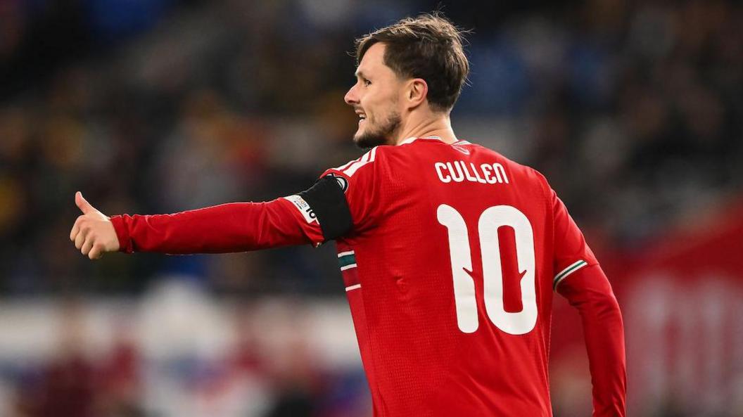 Liam Cullen gives a thumbs-up gesture 