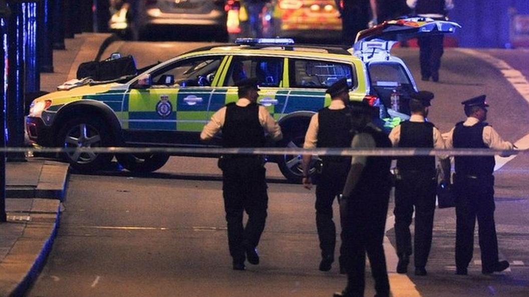 Police officers respond to the London Bridge attack