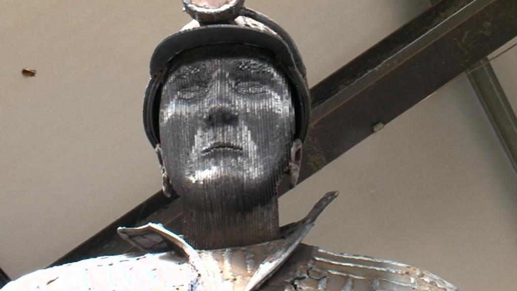 Sculpture of miner