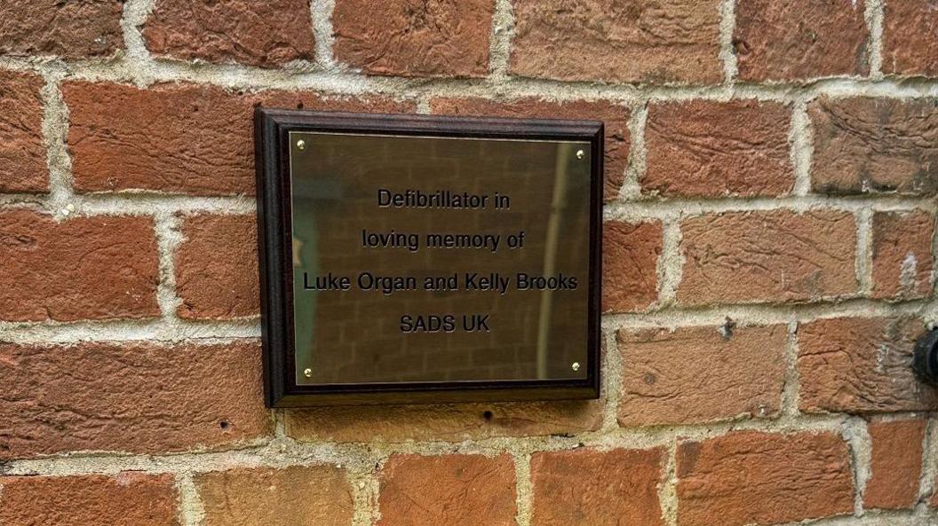 Plaque in loving memory of Luke Organ and Kelly Brooks