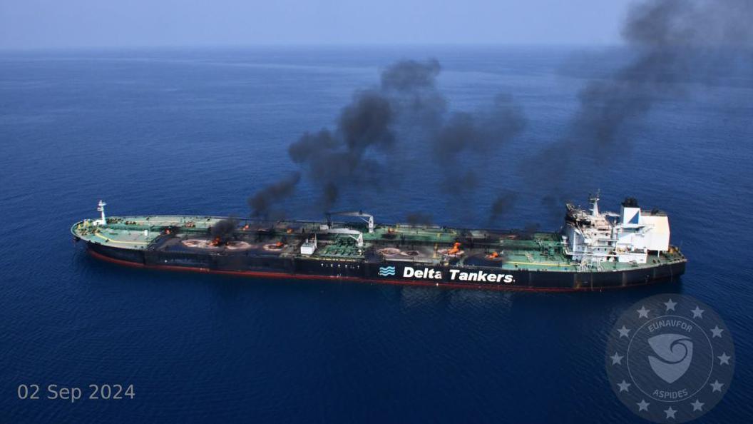 The Sounion tanker in the Red Sea, with fires burning on its deck