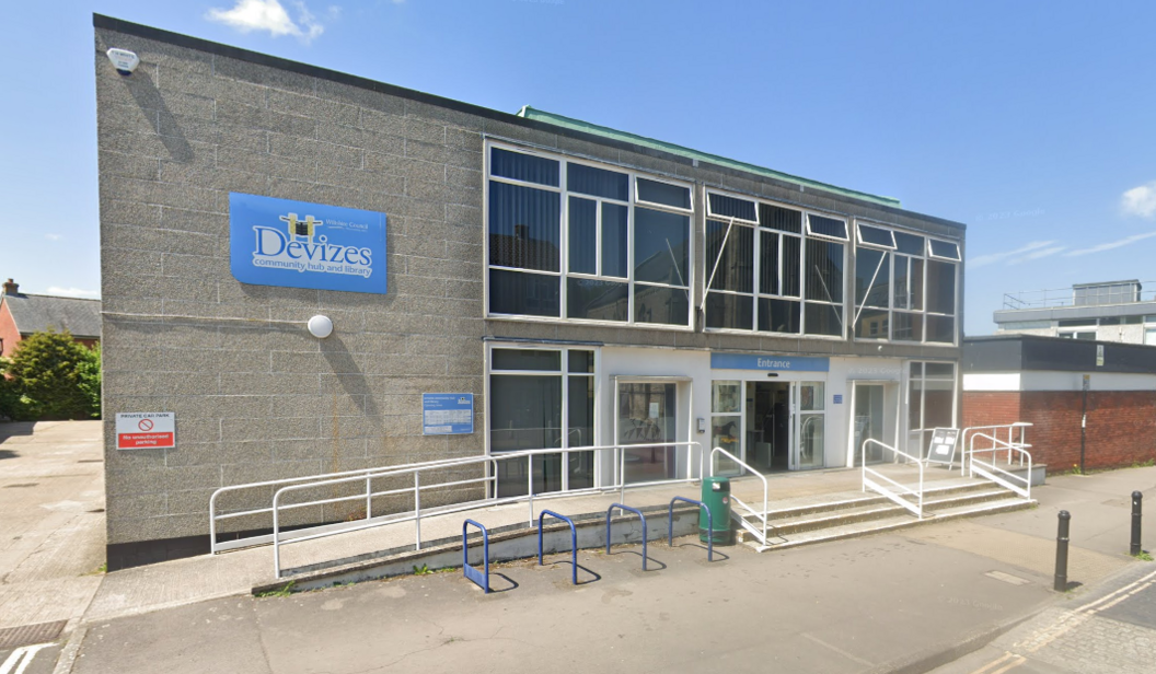 The library in Devizes with steps at the front and a place to park your bike