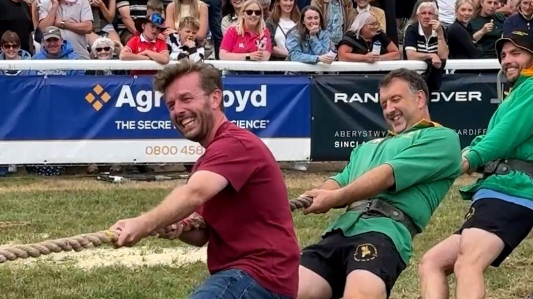 James Williams playing tug of war