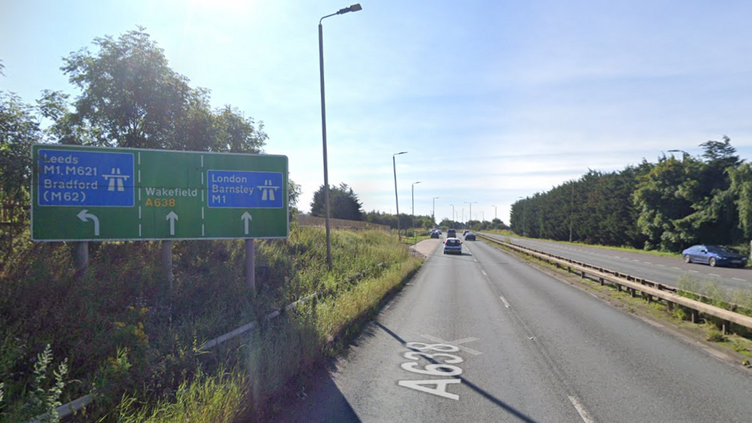 A sign on the A638 with directions towards the M1