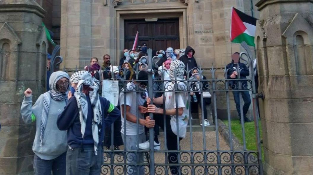 Protesters outside the Whitworth building