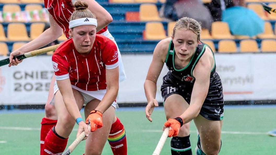 Wales' Izzie Howell (right) competes for possession