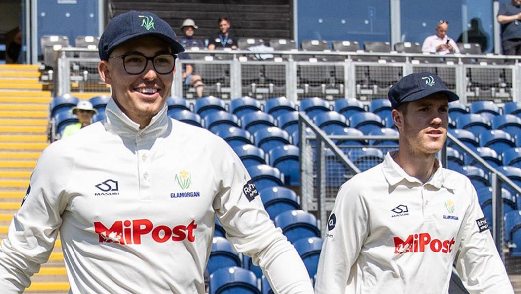 L-R: Asa Tribe and Ben Kellaway walk out for Glamorgan 