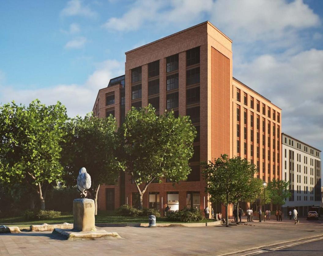 An artist's impression of the block of flats - in red brick - could look