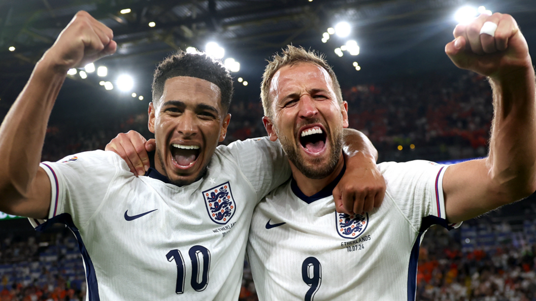 Jude Bellingham and Harry Kane celebrate after England score a goal at Euro 2024