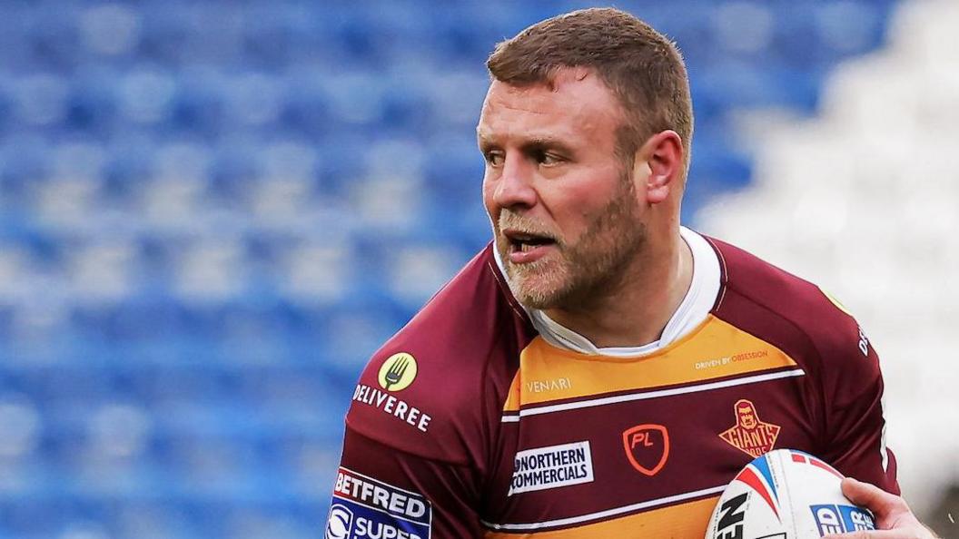 Josh Jones in action for Huddersfield Giants