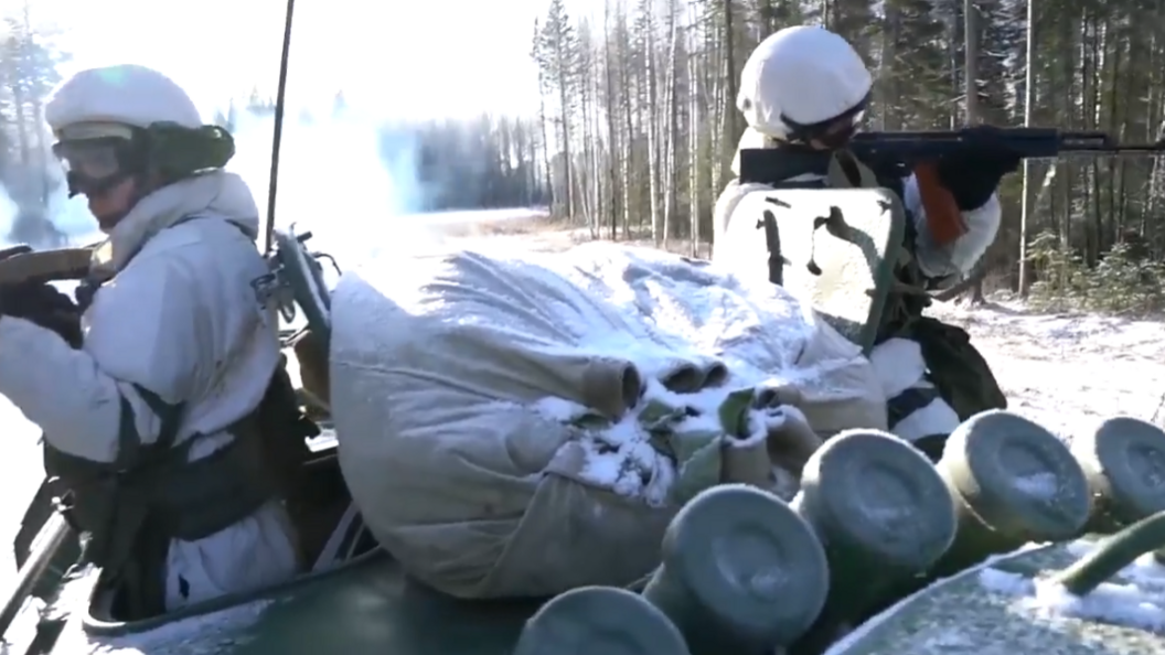 An image of two armed Russian soldiers guarding a patrol on a nuclear base