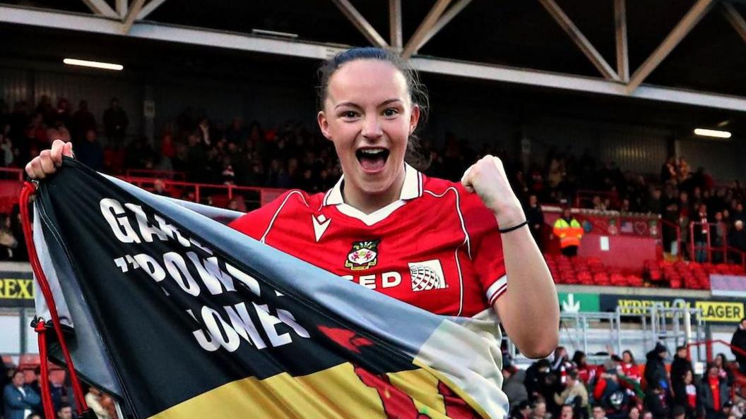 Lili Jones celebrates
