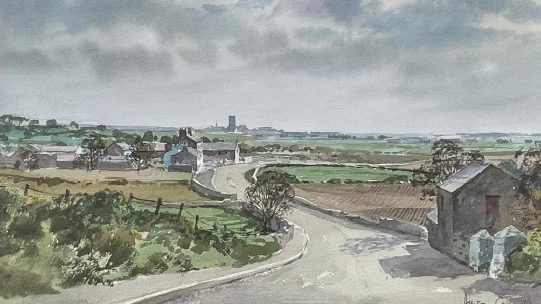 A watercolour painting of a street scene on the Isle of Man. A country road winds around, there are fields on either side, you can also see cottages and a tower in the background.