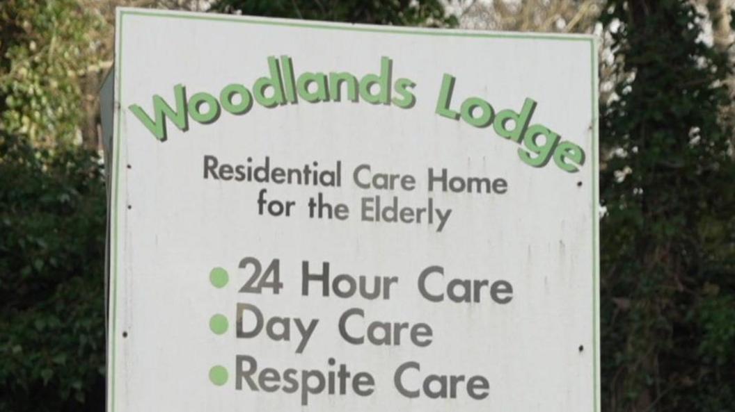 Woodlands Lodge sign