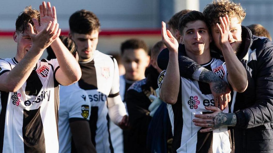 Flint celebrate staying in the Cymru Premier