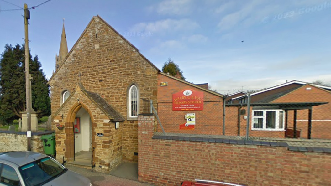 Single-storey brick and stone school building