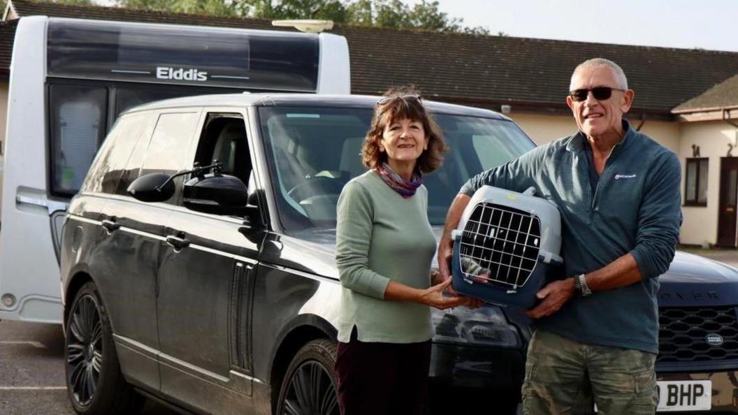 Janet and Paul Atkinson with Bonnie the cat