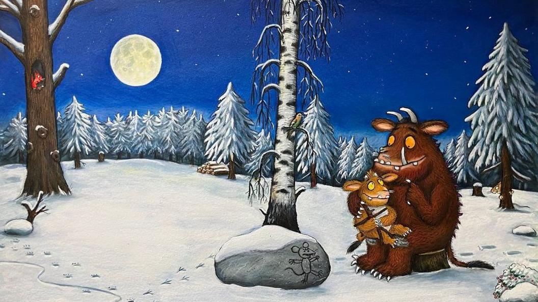 An illustration of a snowy night time scene. The Gruffalo sits on a tree stump holding a baby Gruffalo