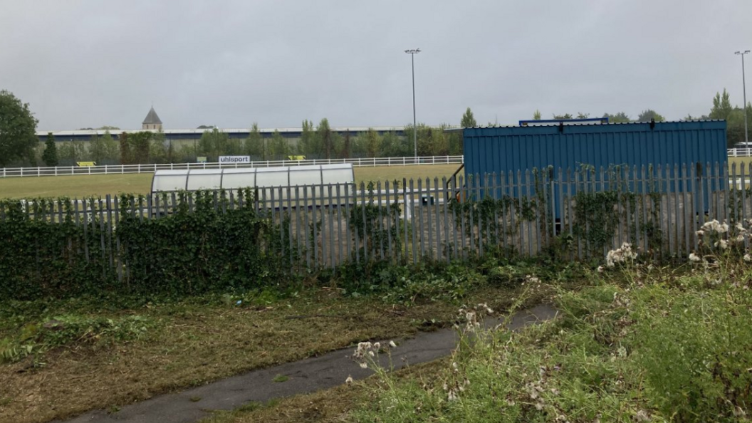 A general view of Saracens Football Club from outside the grounds, with the present changing facilities in the foreground