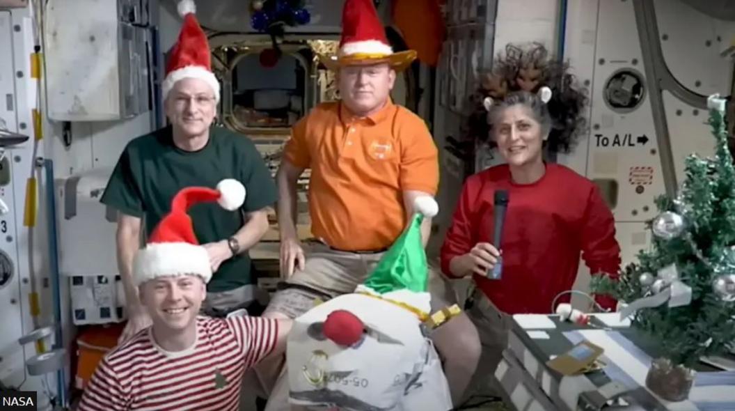 astronauts celebrating Christmas