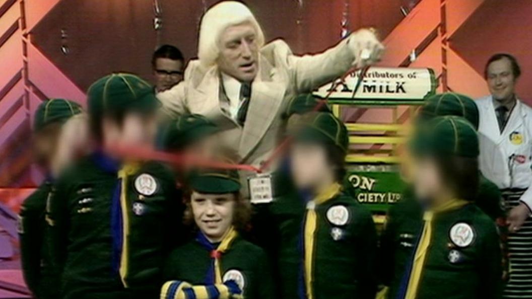 Kevin Cook, centre, alleges he was abused by Jimmy Savile. Shown here on Jim'll Fix it in 1967
