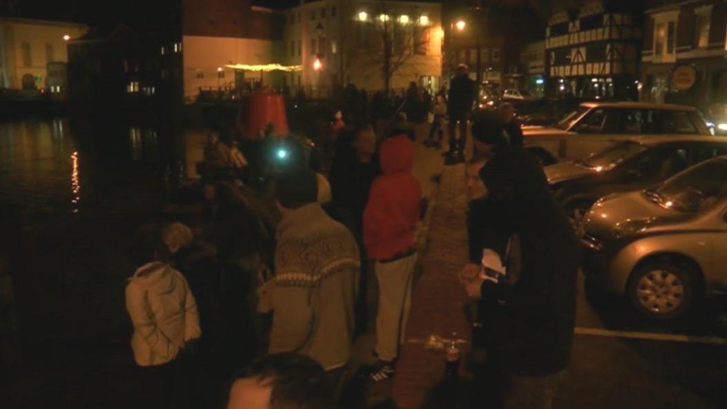 People looking at High Tide in Boston