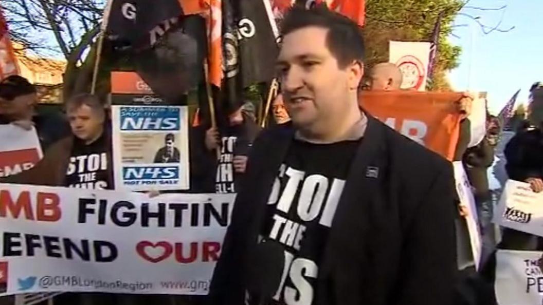 Steve Sweeney of the GMB and protestors