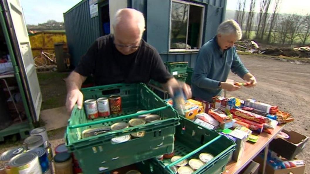 Volunteers sorting food donations out at the Bath food bank