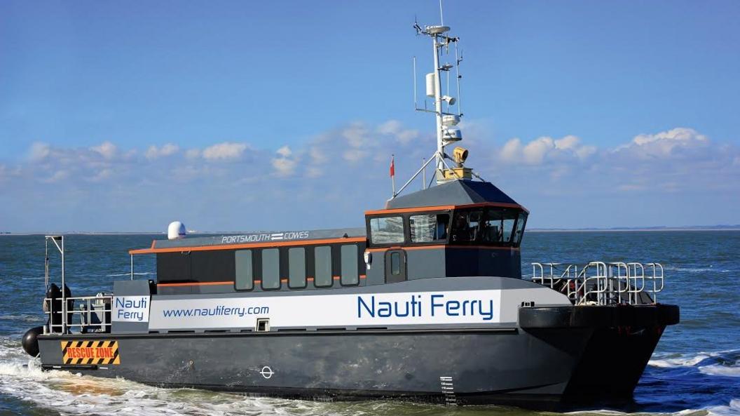 Nauti ferry publicity photo with mock-up logos