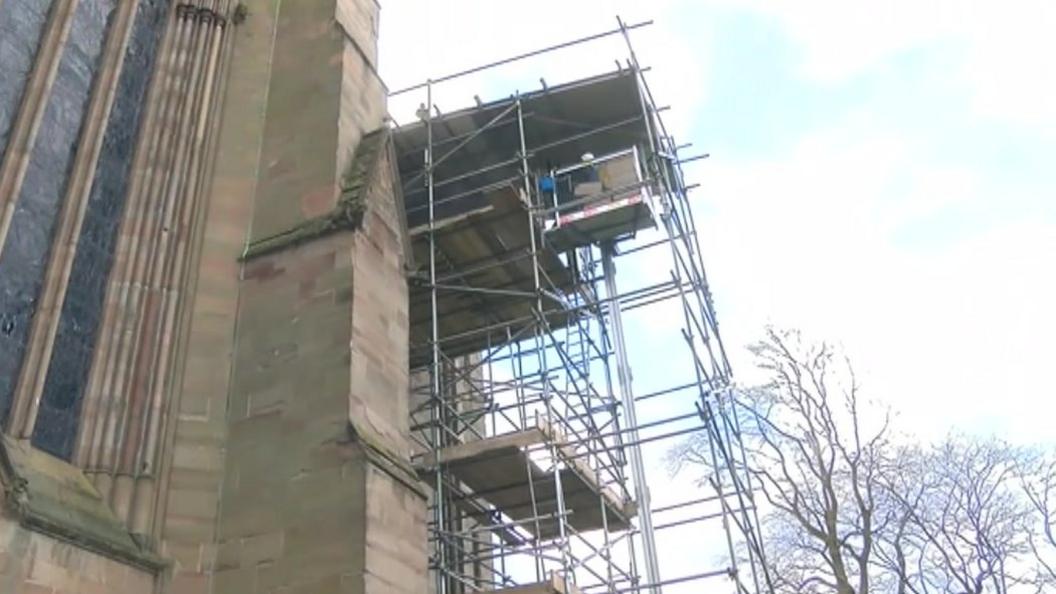 Scaffolding on Worcester Cathedral to remove rare books