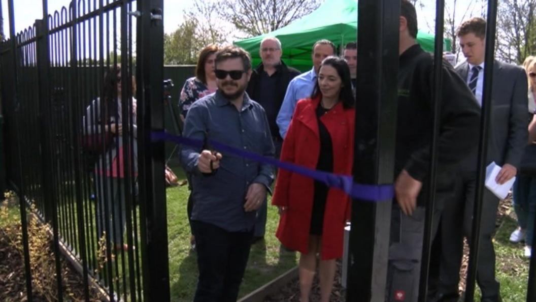 Ribbon cut for Jayden's garden