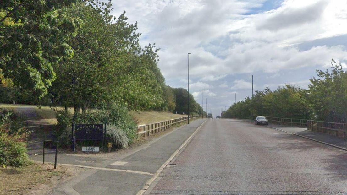 Walker Road in Byker, Newcastle. A footpath to the left leads to Solway Street. 